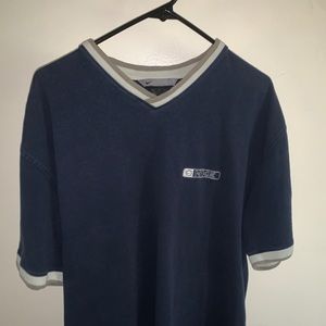 Vintage Nike shirt with multiple colors.